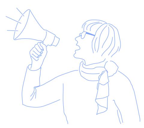 Tarja holding a megaphone.